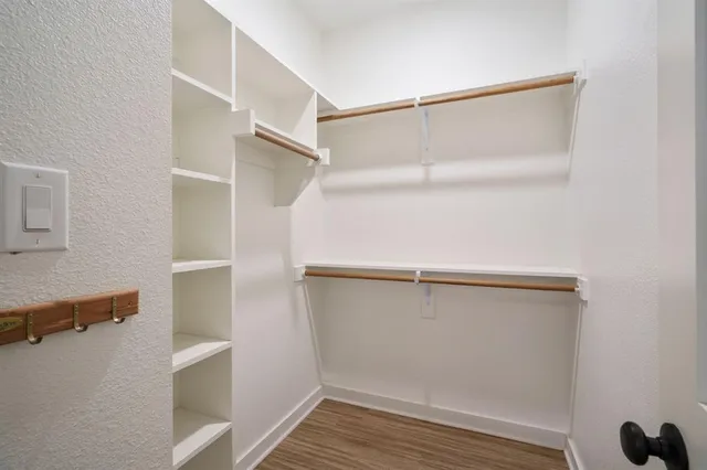a view of an empty walk in closet