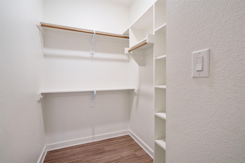 313 East 3rd Street Prosper, TX 75078 - Photo 20 of 38 a view of an empty walk in closet