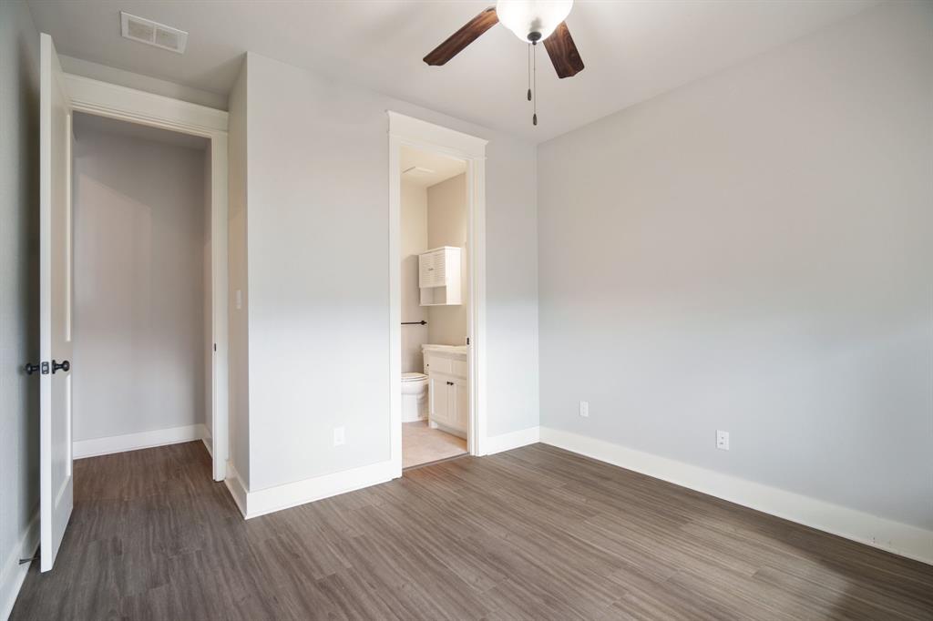 313 East 3rd Street Prosper, TX 75078 - Photo 23 of 38 wooden floor in an empty room with a window