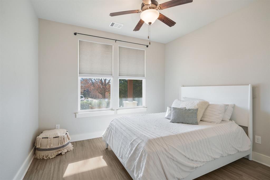 313 East 3rd Street Prosper, TX 75078 - Photo 25 of 38 a bedroom with a large bed and a window