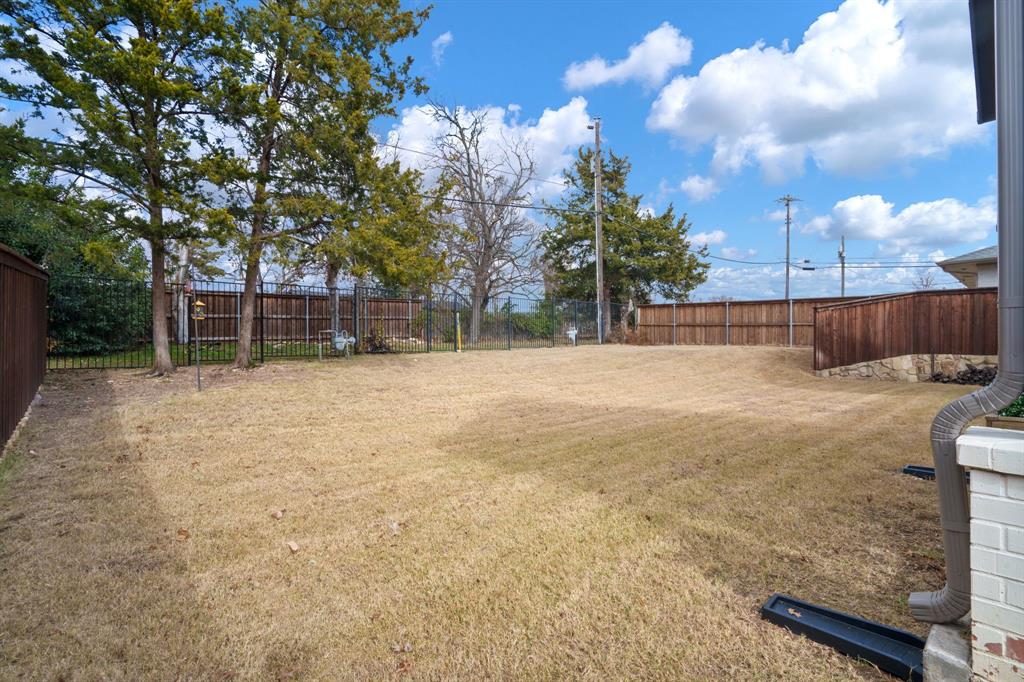 313 East 3rd Street Prosper, TX 75078 - Photo 32 of 38 a view of swimming pool with an outdoor space