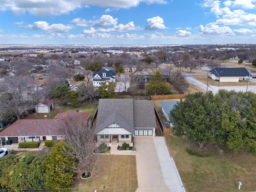 313 East 3rd Street Prosper, TX 75078 - Photo 36 of 38 an aerial view of a house with a yard