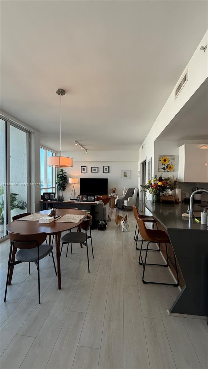 601 Northeast 27th Street, Unit 1003 Miami, FL 33137 - Photo 5 of 31 a room with furniture pool table and a table