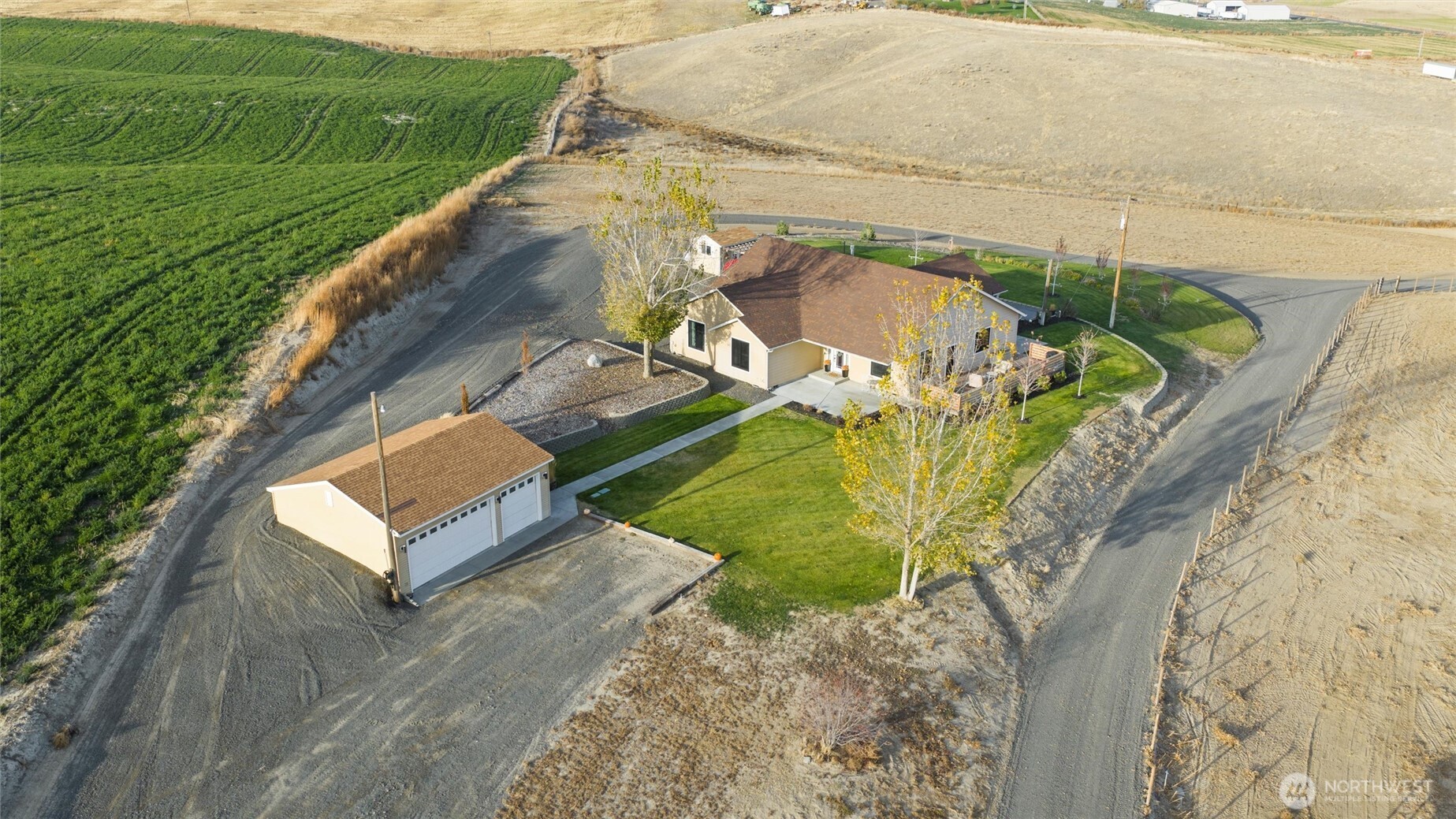 a view of a swimming pool with a yard