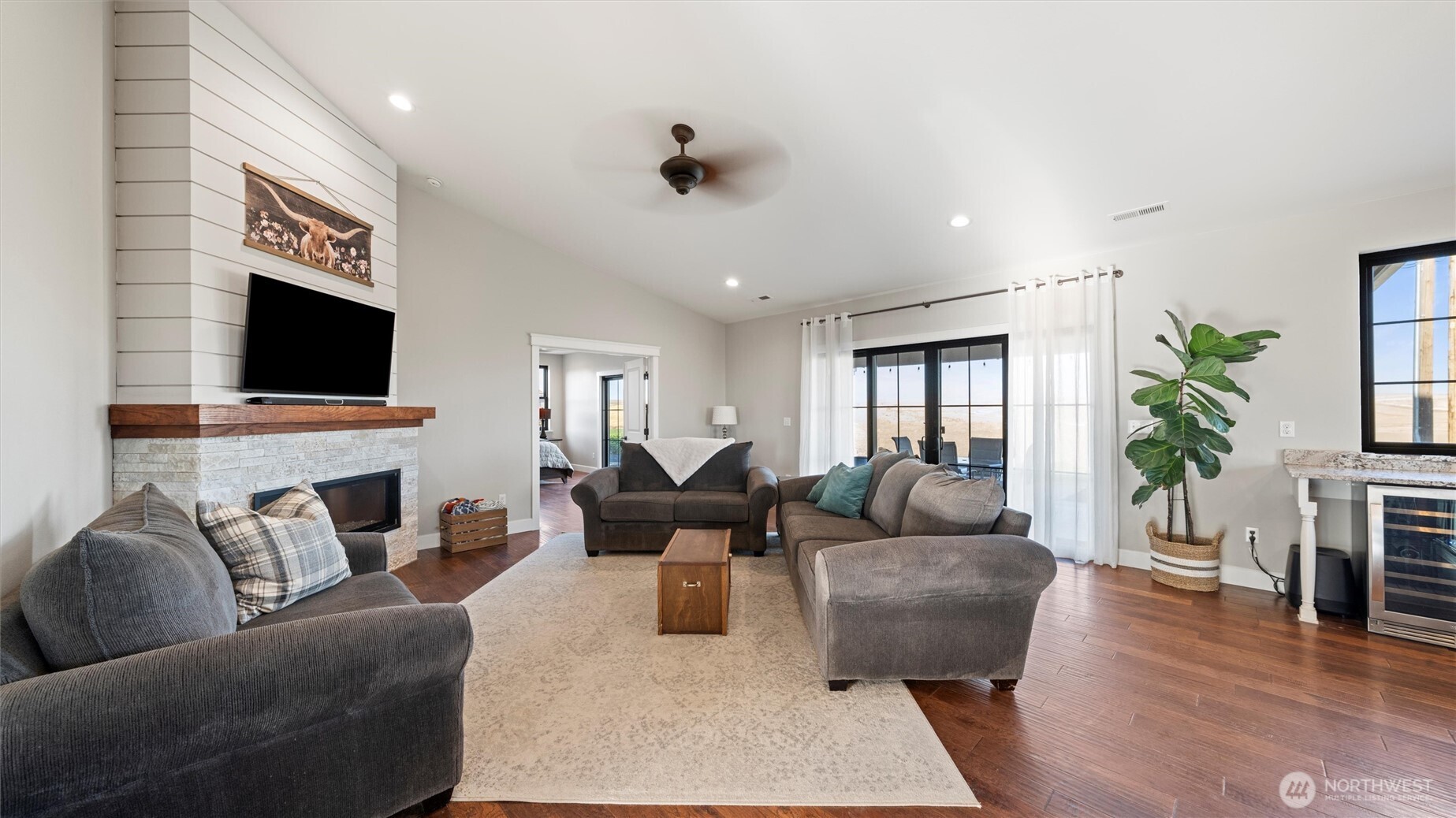 1279 Woodward Canyon Road Touchet, WA 99360 - Photo 12 of 35 a living room with furniture and a flat screen tv