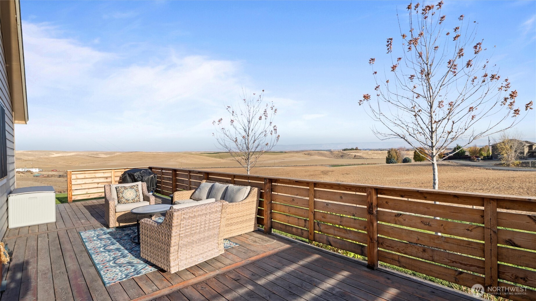 1279 Woodward Canyon Road Touchet, WA 99360 - Photo 29 of 35 a view of a terrace with wooden floor and fence