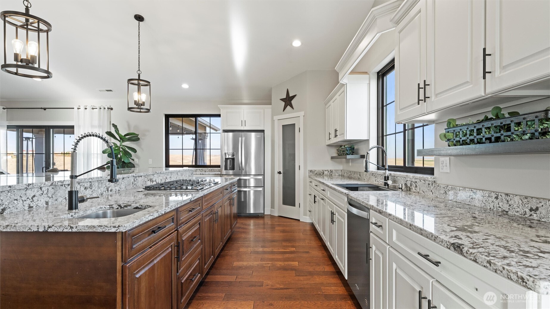 1279 Woodward Canyon Road Touchet, WA 99360 - Photo 6 of 35 a kitchen with stainless steel appliances granite countertop a sink and stove