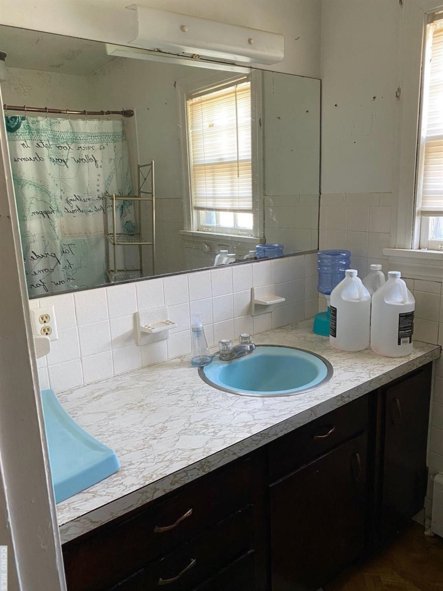 413 Stone Mill Road Claverack, NY 12534 - Photo 17 of 18 a bathroom with a granite countertop sink a mirror and a bathtub