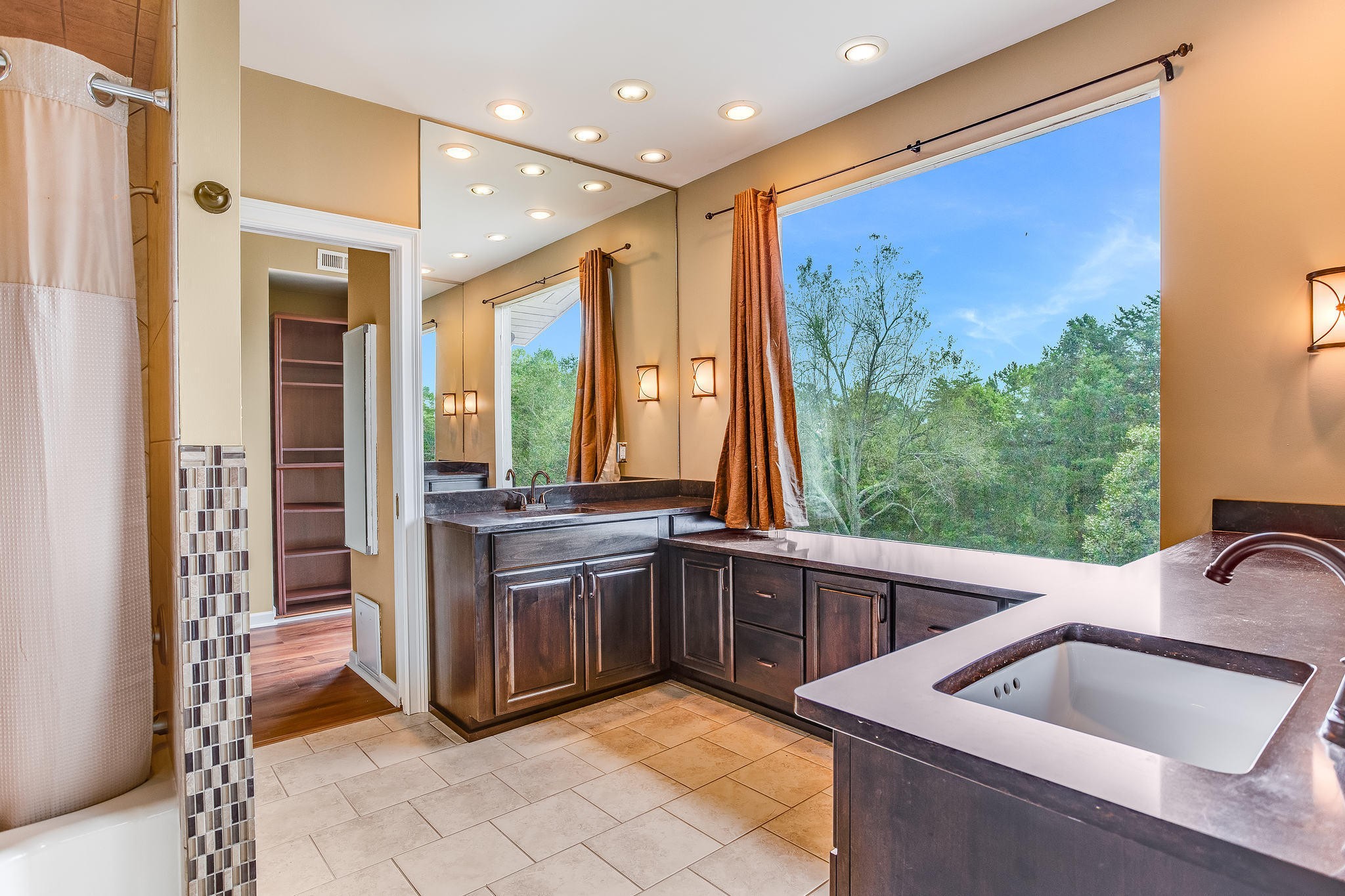 601 Self Hollow Road Rockford, TN 37853 - Photo 11 of 40 a large kitchen with stainless steel appliances granite countertop a sink and a view of living room