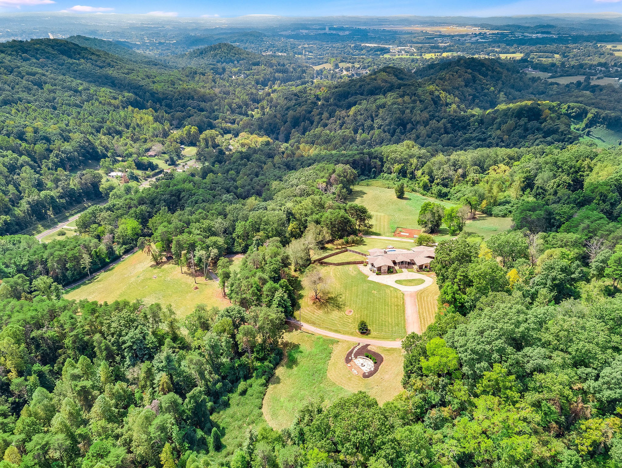 601 Self Hollow Road Rockford, TN 37853 - Photo 14 of 40 an aerial view of residential house with an outdoor space and seating area