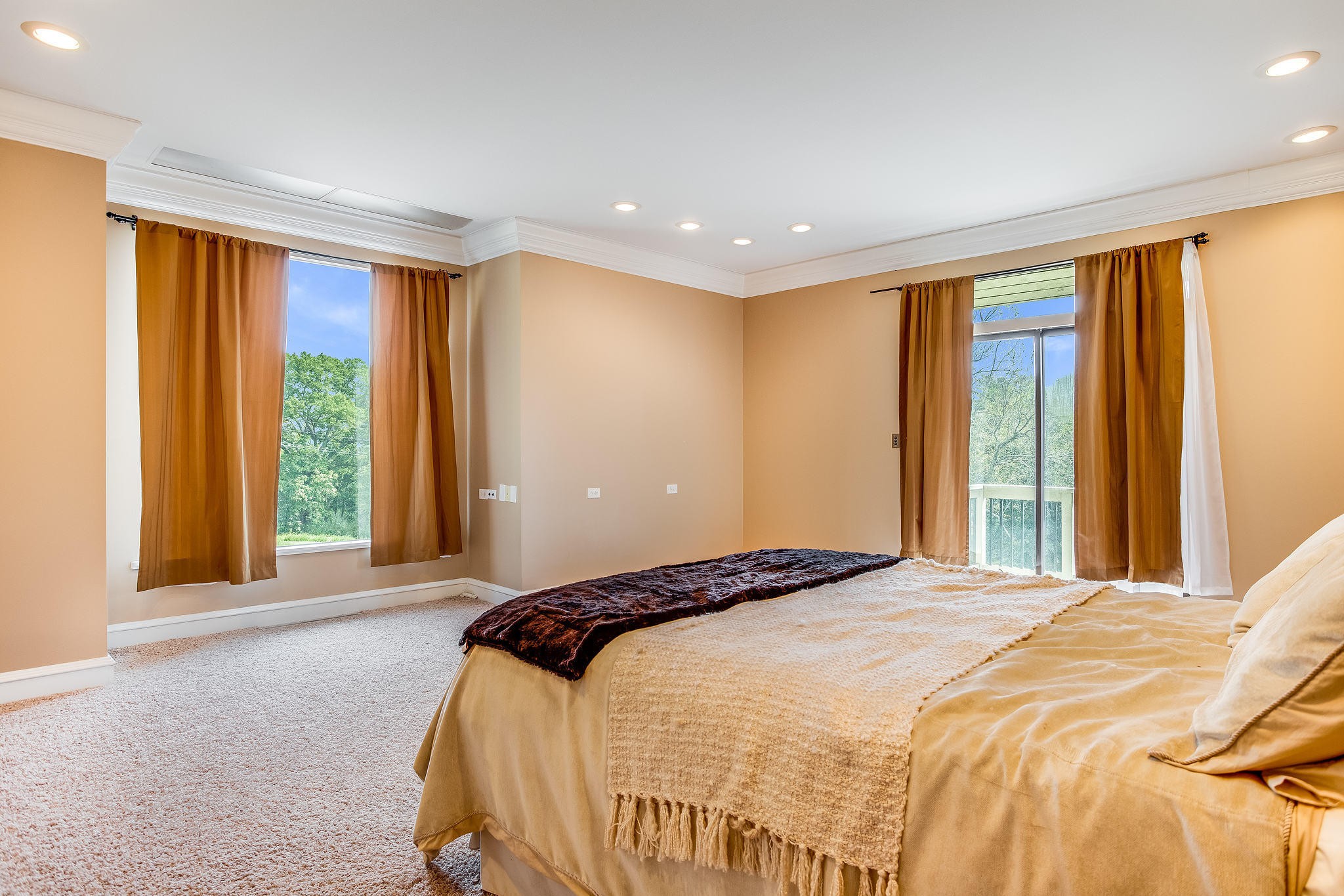 601 Self Hollow Road Rockford, TN 37853 - Photo 17 of 40 a spacious bedroom with a large bed and a large window