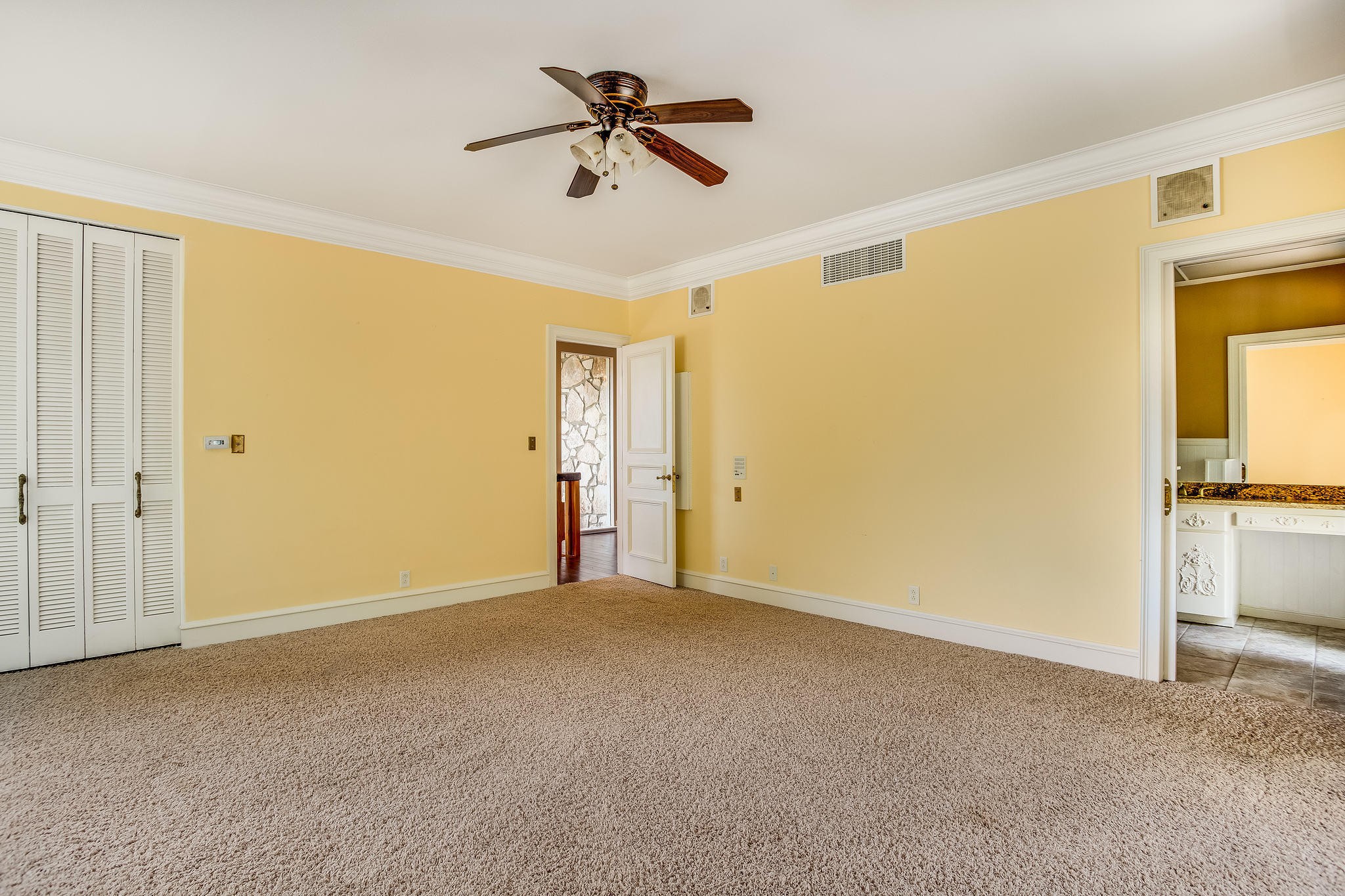 601 Self Hollow Road Rockford, TN 37853 - Photo 25 of 40 a view of a livingroom with a ceiling fan & windows