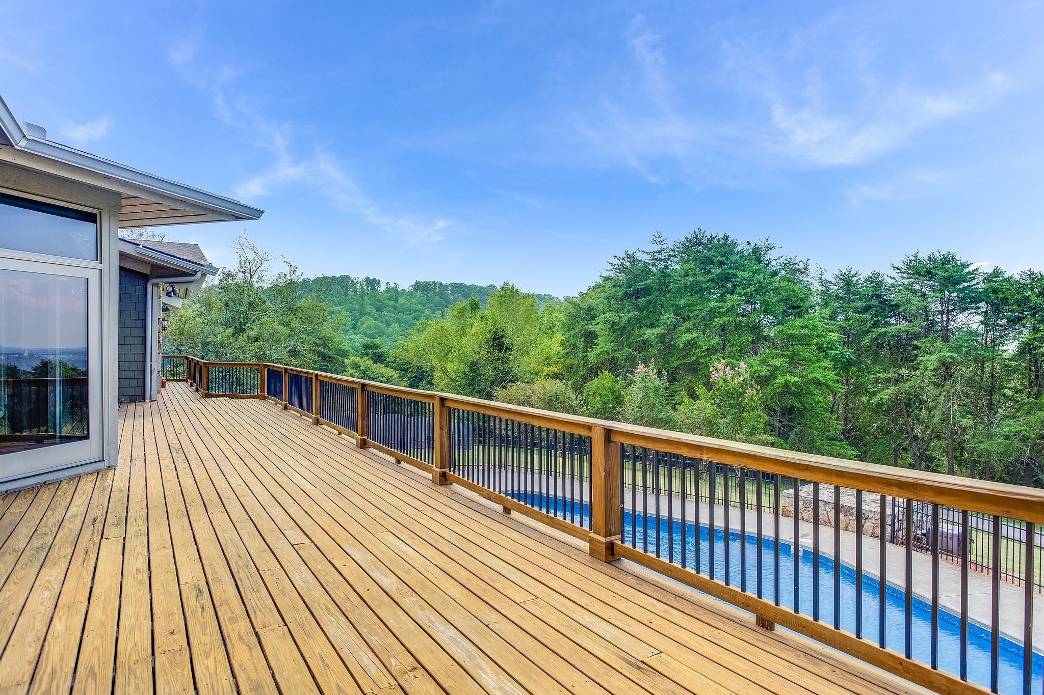 601 Self Hollow Road Rockford, TN 37853 - Photo 3 of 40 a view of balcony with deck and wooden floor