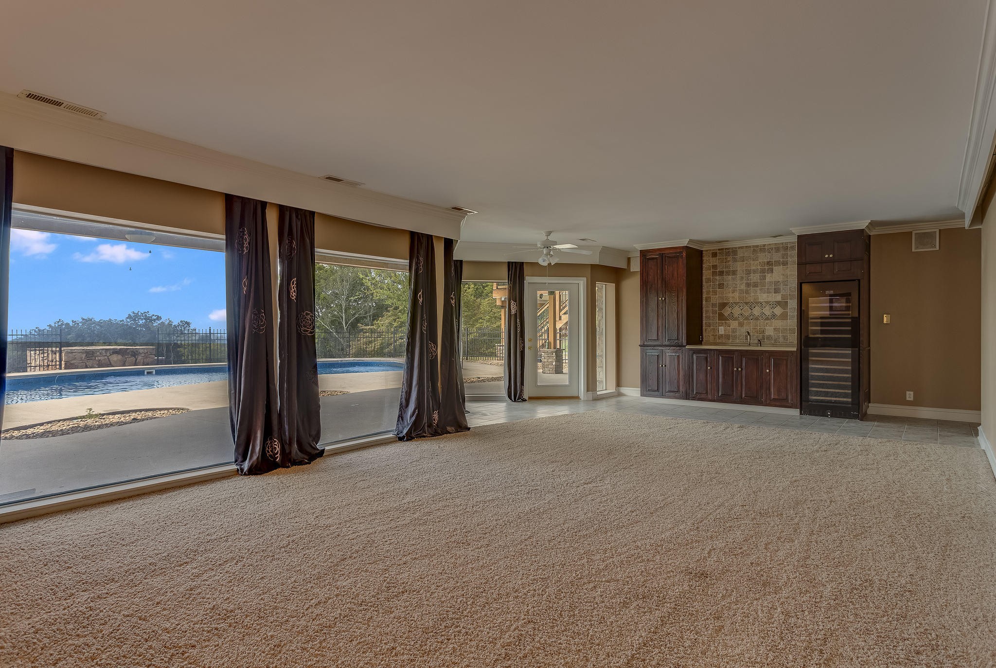 601 Self Hollow Road Rockford, TN 37853 - Photo 32 of 40 a view of an empty room with a window and refrigerator