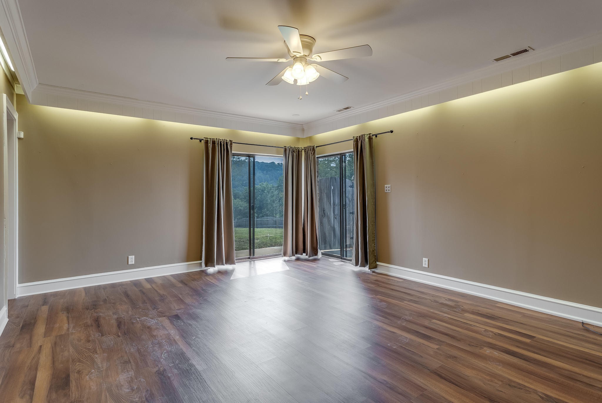 601 Self Hollow Road Rockford, TN 37853 - Photo 33 of 40 a view of an empty room with window and wooden floor