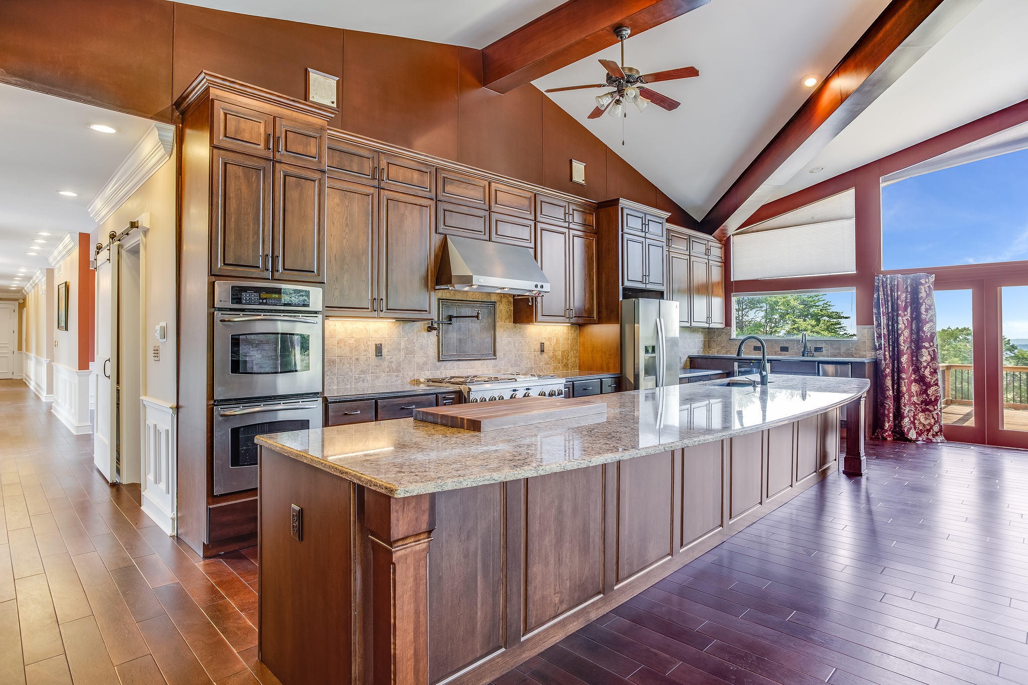 601 Self Hollow Road Rockford, TN 37853 - Photo 4 of 40 a kitchen with stainless steel appliances granite countertop a stove refrigerator and wooden floor