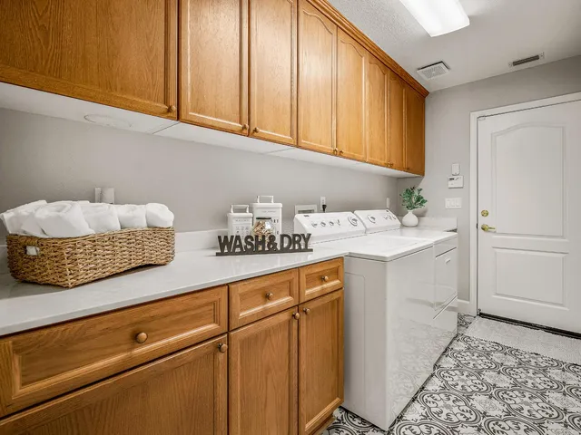 a bathroom with a toilet a sink and a shower