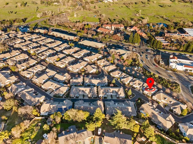 a view of a swimming pool with a yard