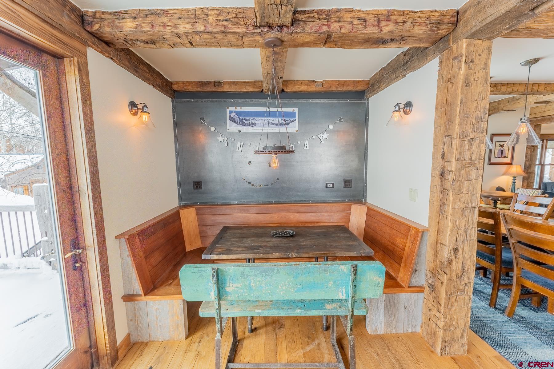 1 Teocalli Avenue Crested Butte, CO 81224 - Photo 14 of 35 a room with table and chairs