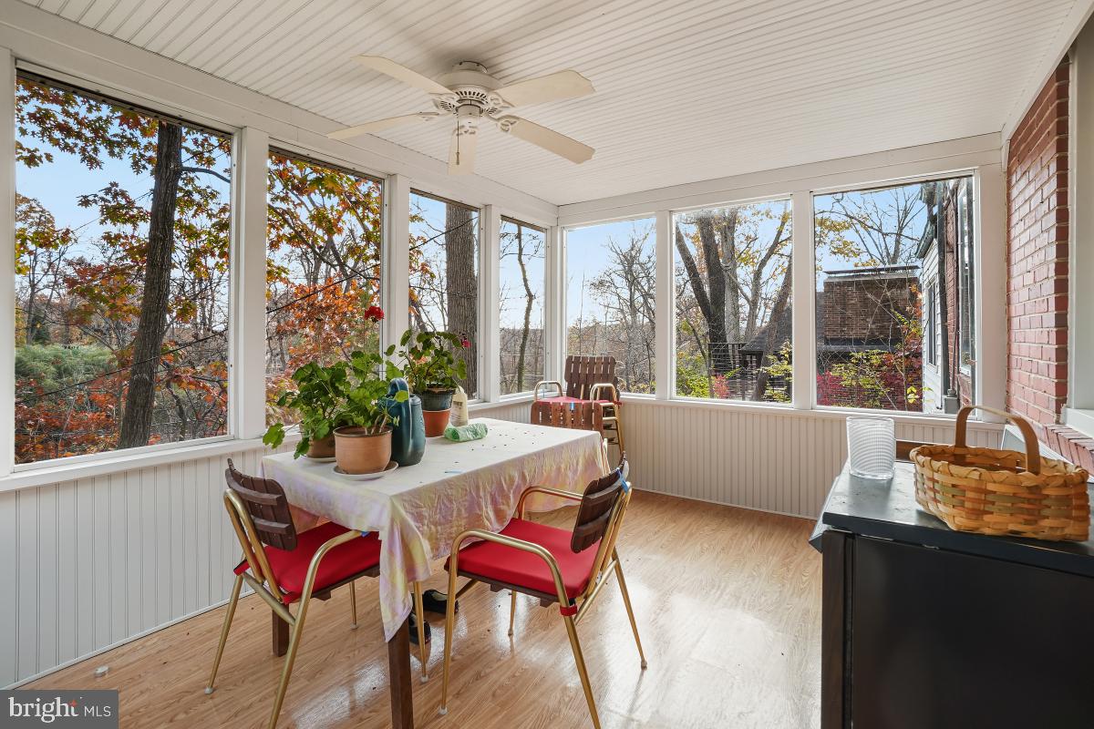 6540 Wiscasset Road Bethesda, MD 20816 - Photo 18 of 33 a view of a dining room with furniture window and outside view