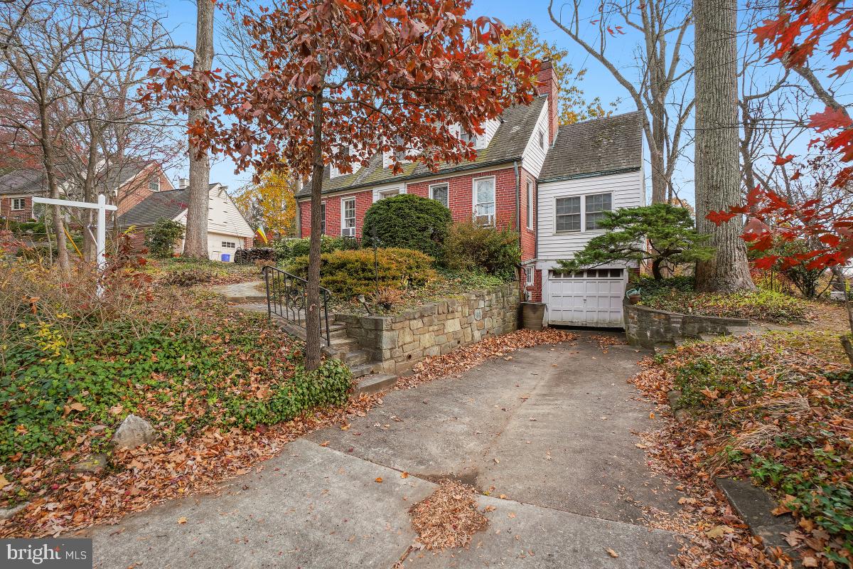 6540 Wiscasset Road Bethesda, MD 20816 - Photo 2 of 33 a view of a house with backyard and sitting area