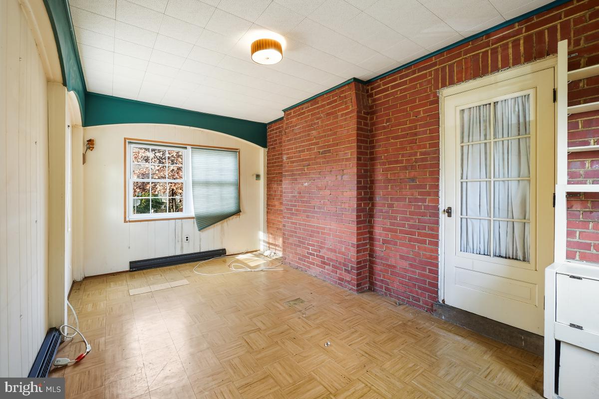 6540 Wiscasset Road Bethesda, MD 20816 - Photo 22 of 33 a view of an empty room and window