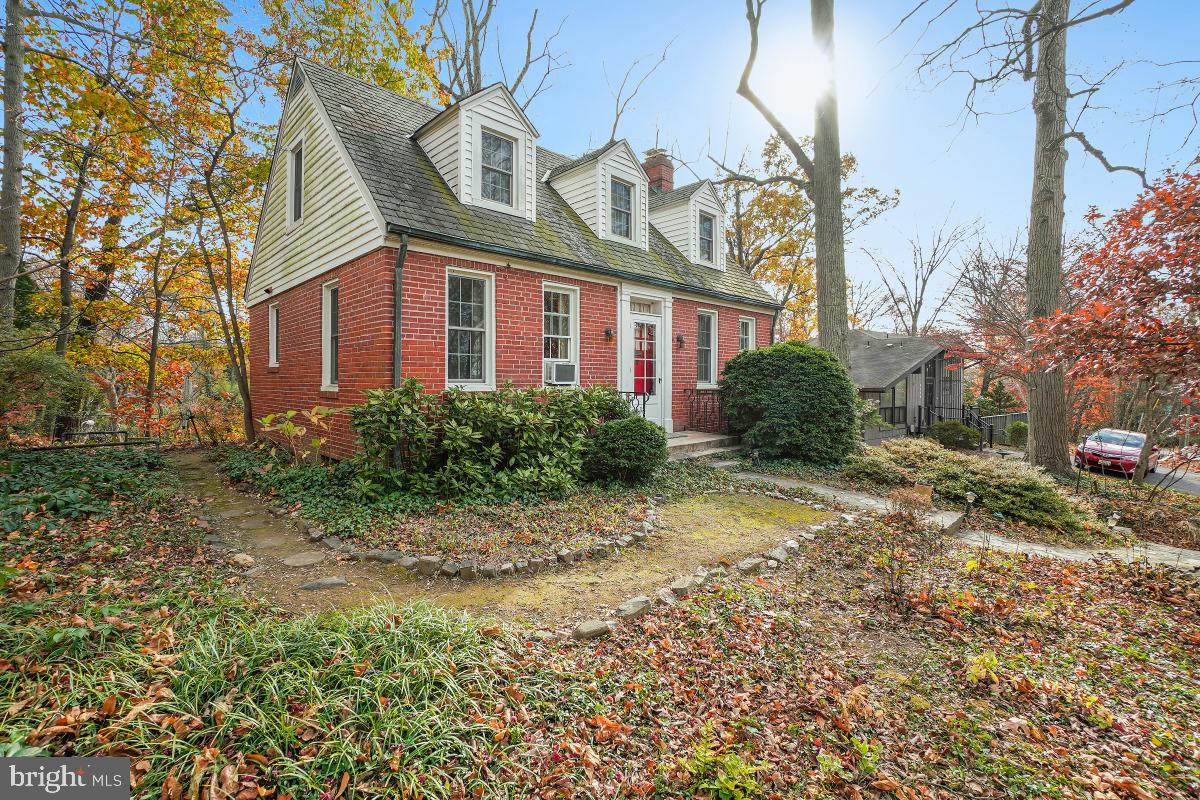 6540 Wiscasset Road Bethesda, MD 20816 - Photo 5 of 33 a view of a brick building next to a yard