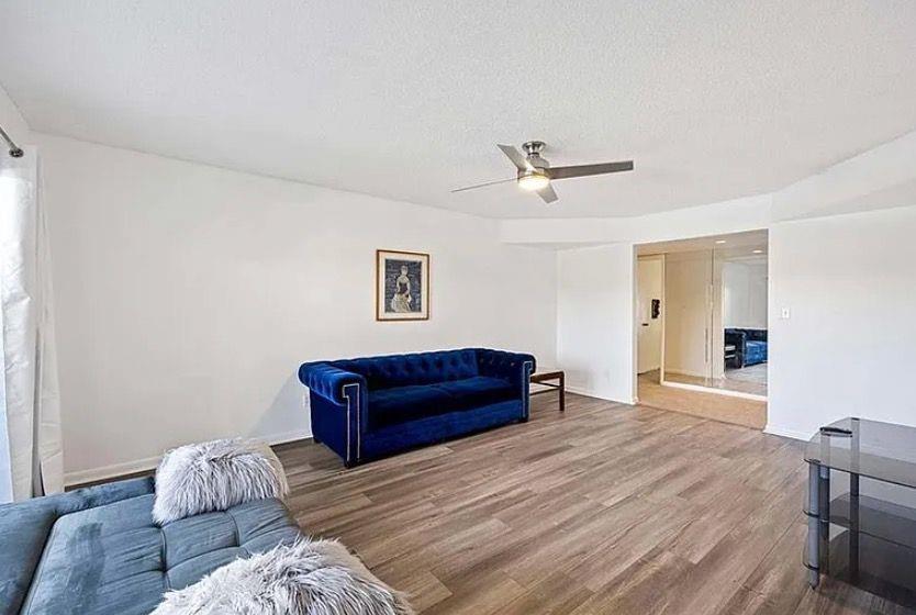 209 Bobolink Way, Unit A Naples, FL 34105 - Photo 6 of 23 a living room with couches and furniture