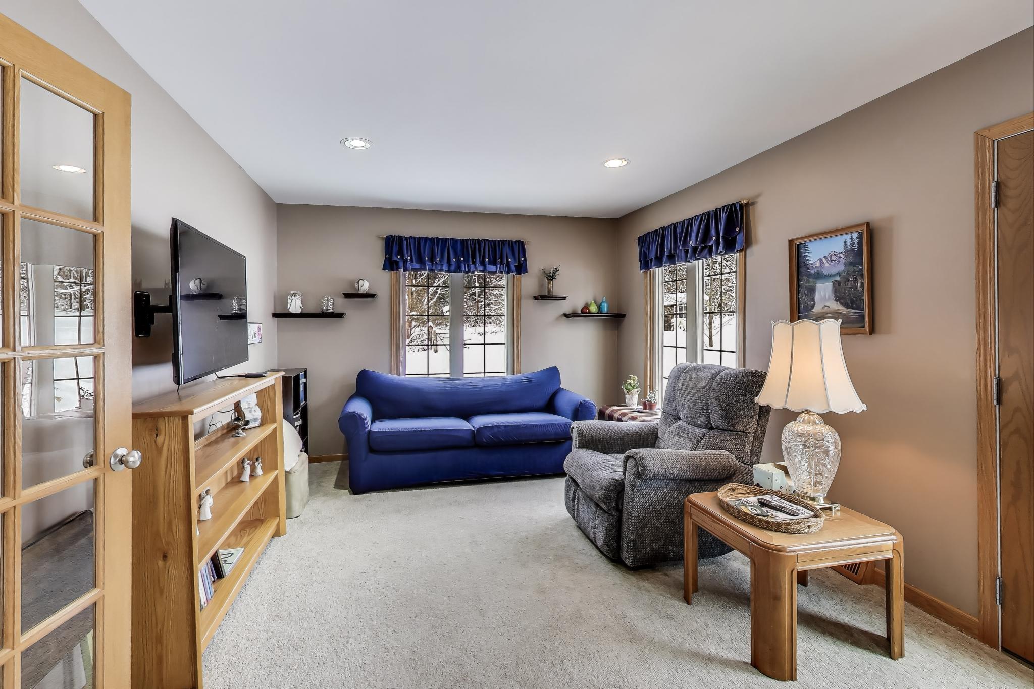 W312S8869 Cherokee Pass Mukwonago, WI 53149 - Photo 20 of 75 Sunroom overlooks the back yard.