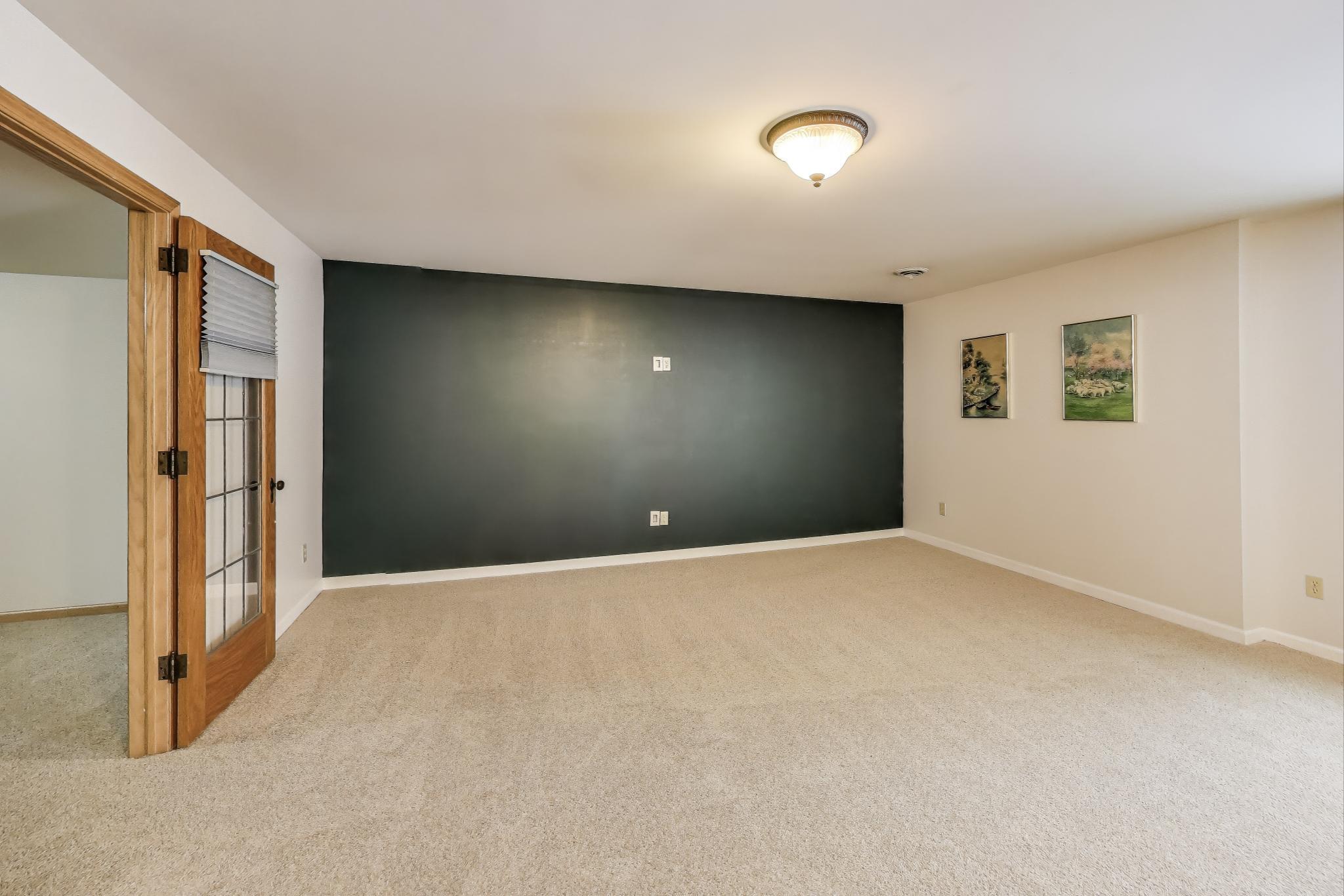 W312S8869 Cherokee Pass Mukwonago, WI 53149 - Photo 36 of 75 Family room on lower level