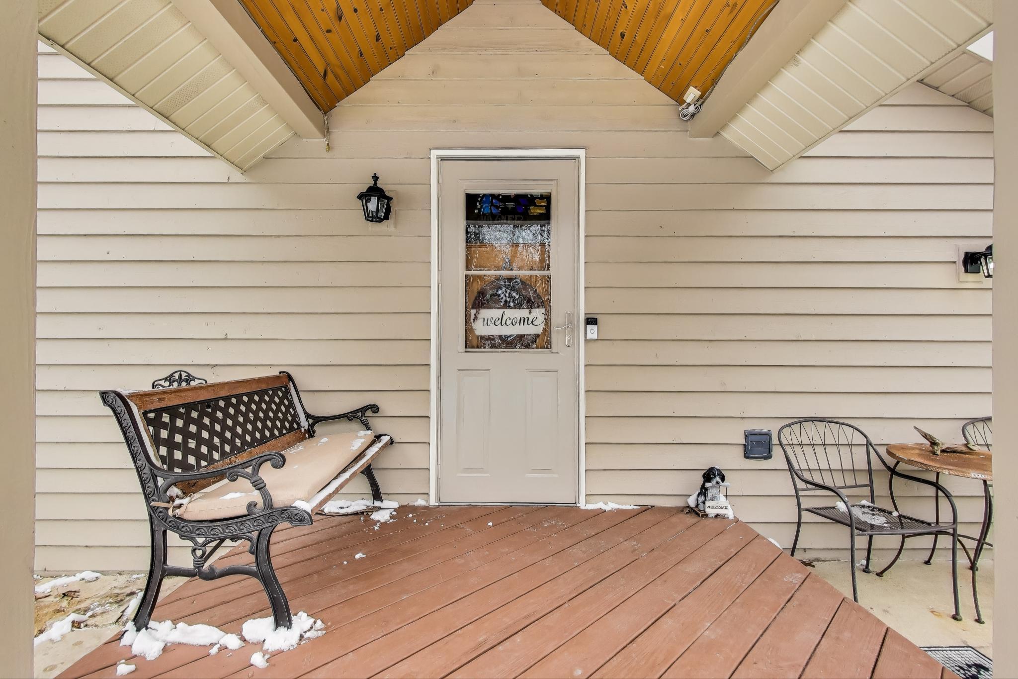 W312S8869 Cherokee Pass Mukwonago, WI 53149 - Photo 63 of 75 Side entry leads to laundry room, mud room and kitchen.