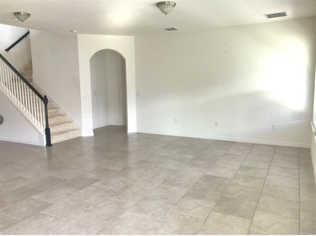 14903 Fells Lane Orlando, FL 32827 - Photo 7 of 14 a view of a room with drop ceiling