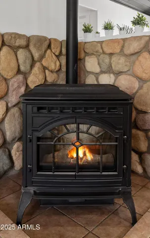 a view of fireplace in wooden floor