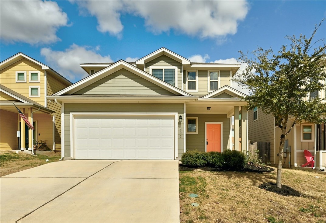 232 Triumph Road Buda, TX 78610 - Photo 1 of 1 a front view of a house with a yard