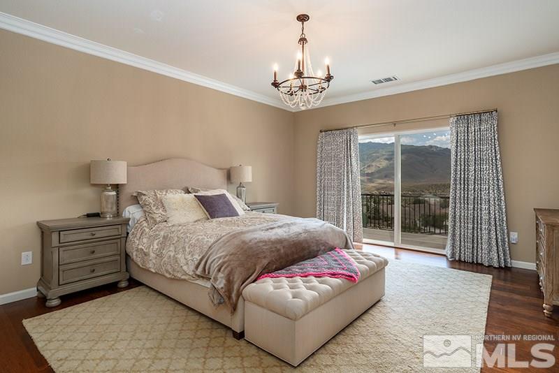 1640 Back Nine Trail Reno, NV 89523 - Photo 17 of 35 a living room with furniture and a chandelier
