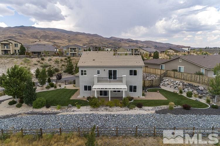 1640 Back Nine Trail Reno, NV 89523 - Photo 32 of 35 a view of a big house with a big yard and large trees