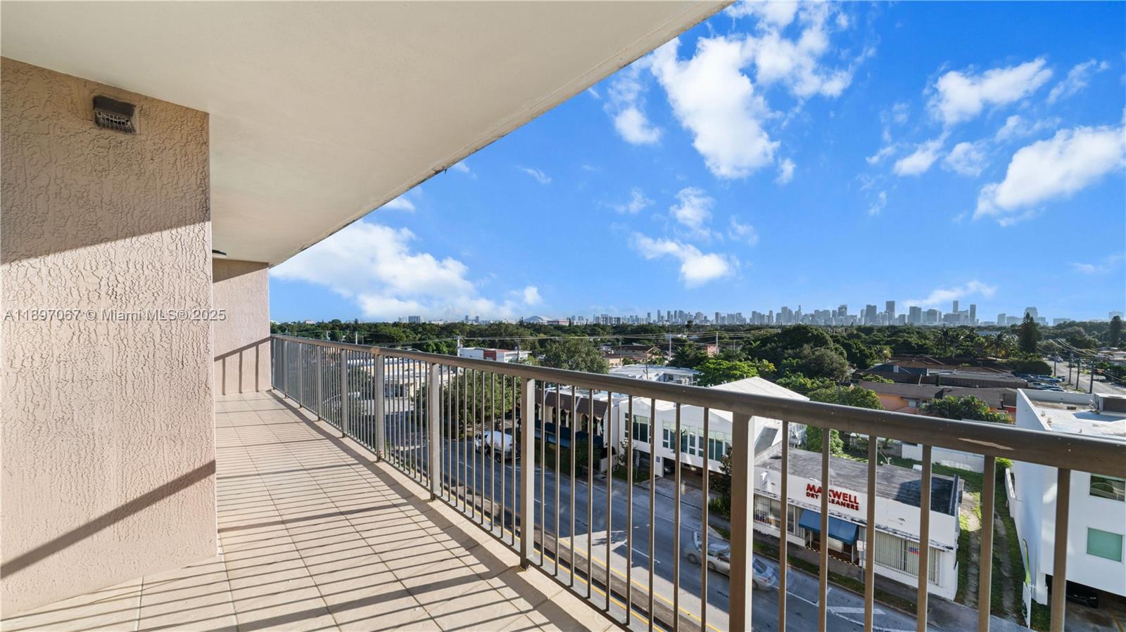 1690 Southwest 27th Avenue, Unit 603 Miami, FL 33145 - Photo 21 of 41 a view of city from a balcony