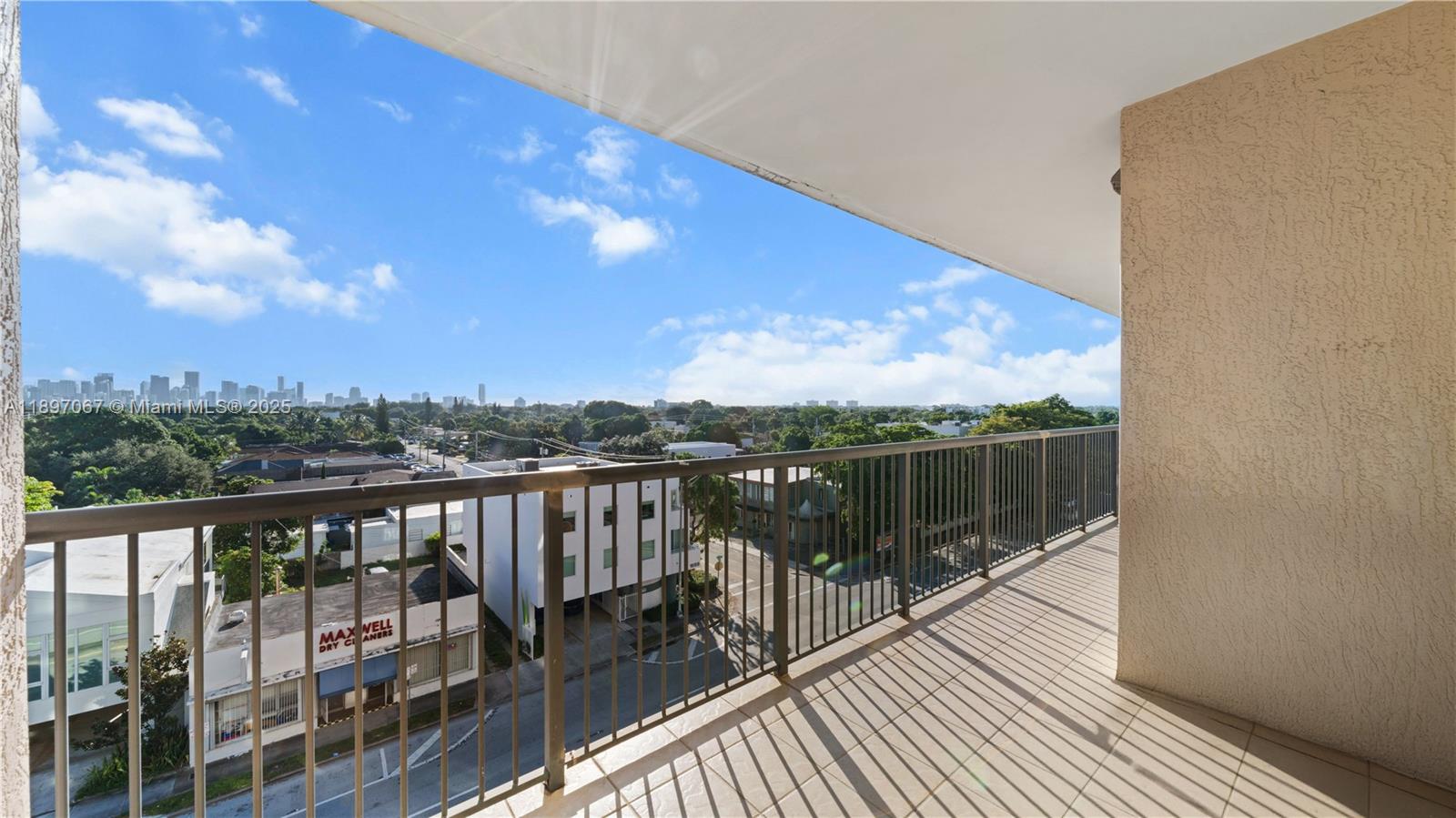 1690 Southwest 27th Avenue, Unit 603 Miami, FL 33145 - Photo 22 of 41 a view of balcony with a lake