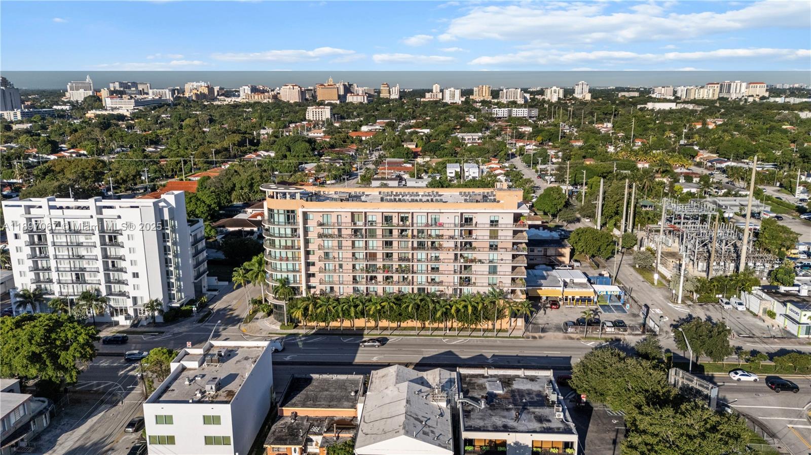 1690 Southwest 27th Avenue, Unit 603 Miami, FL 33145 - Photo 3 of 41 a view of a city with tall buildings