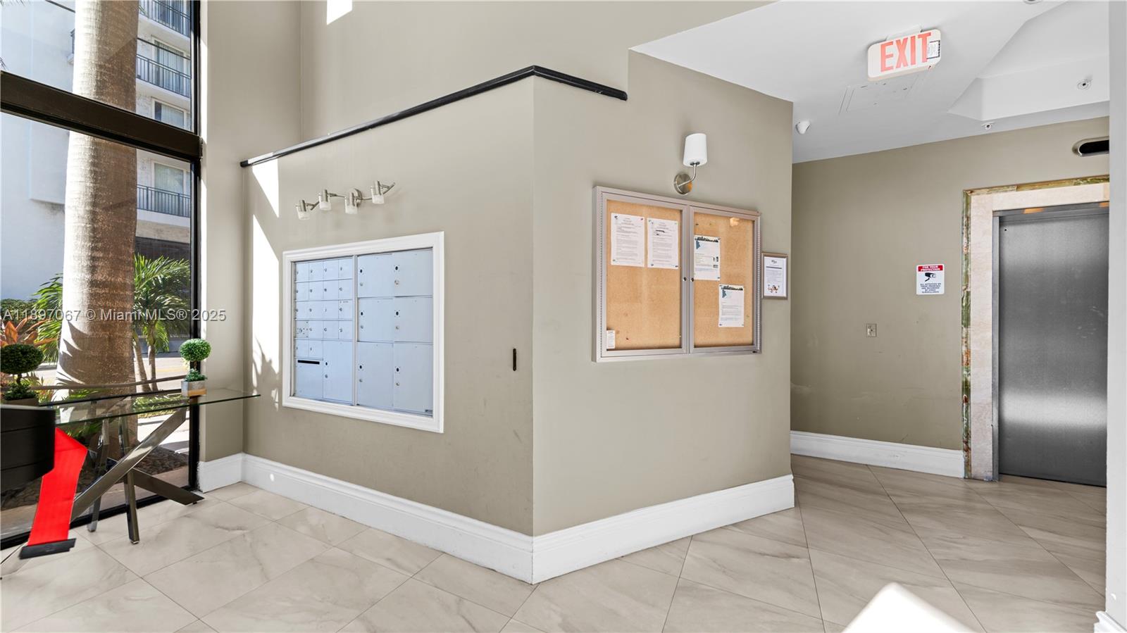 1690 Southwest 27th Avenue, Unit 603 Miami, FL 33145 - Photo 36 of 41 a view of a livingroom with furniture and windows