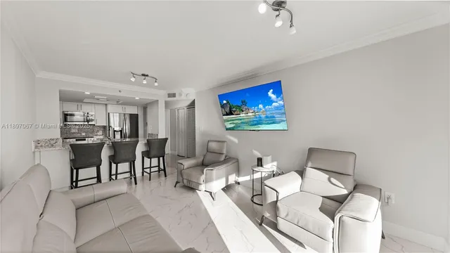 a living room with furniture a rug and a wall painting