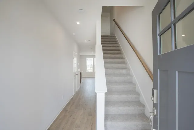 a view of staircase with white walls and white walls