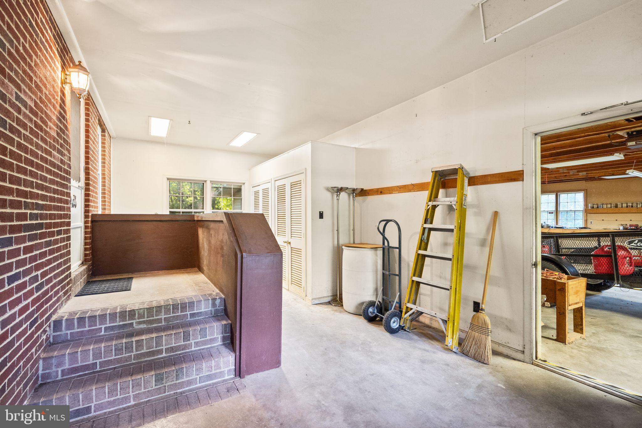 8311 Pohick Road Springfield, VA 22153 - Photo 27 of 92 a view of a bedroom with furniture and windows