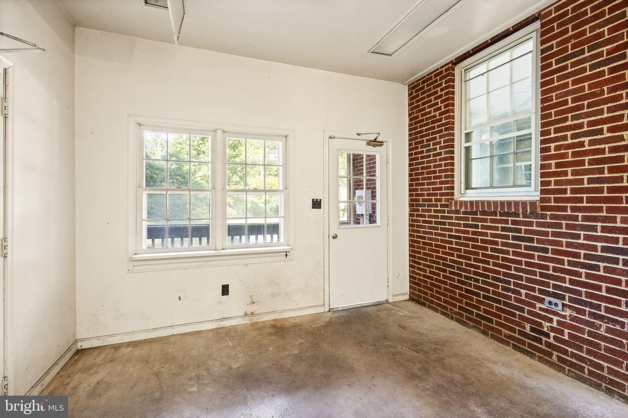 8311 Pohick Road Springfield, VA 22153 - Photo 29 of 92 a view of an empty room with a window