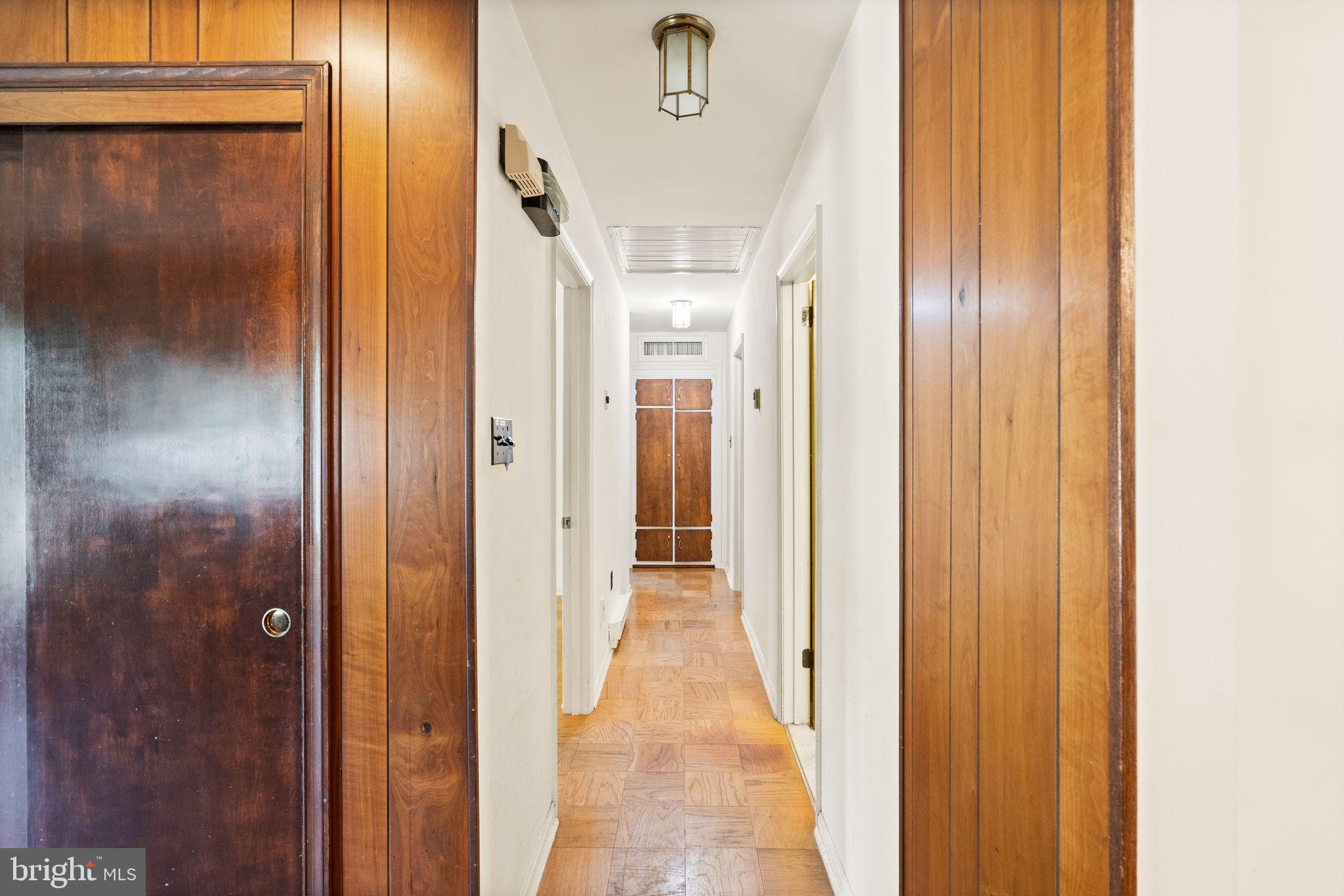8311 Pohick Road Springfield, VA 22153 - Photo 35 of 92 a view of a bathroom from a hallway