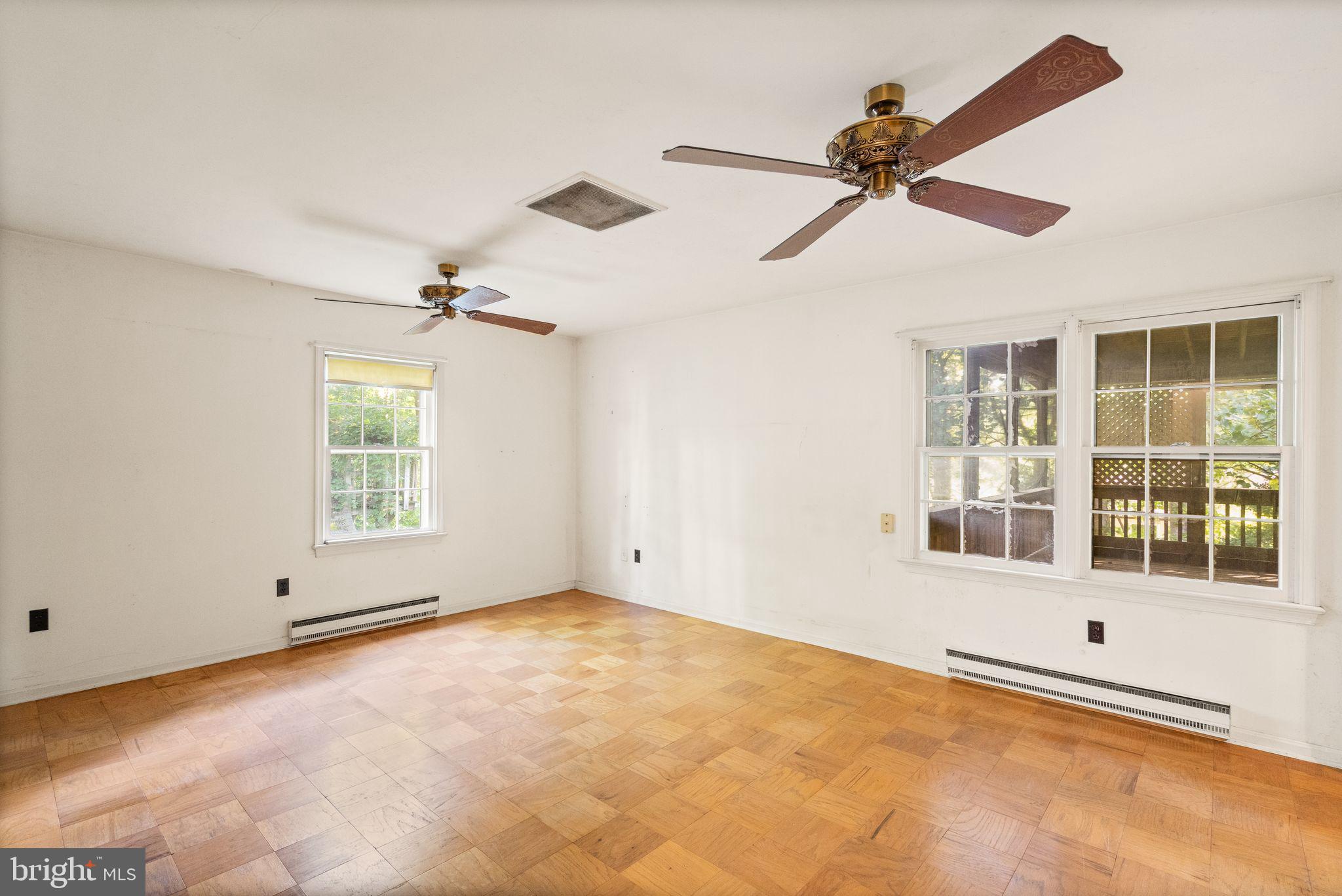 8311 Pohick Road Springfield, VA 22153 - Photo 40 of 92 a view of an empty room with a window