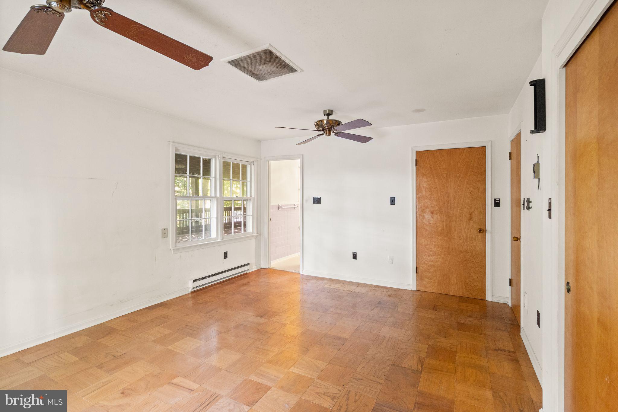 8311 Pohick Road Springfield, VA 22153 - Photo 42 of 92 a view of an empty room with a window