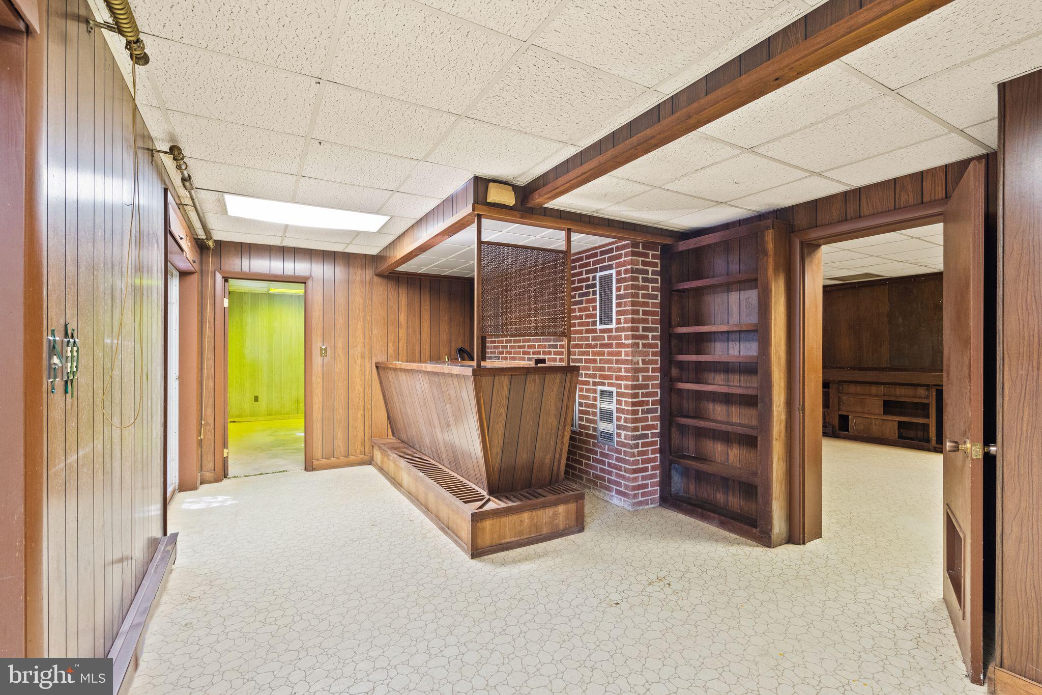 8311 Pohick Road Springfield, VA 22153 - Photo 50 of 92 a view of a room with wooden floor