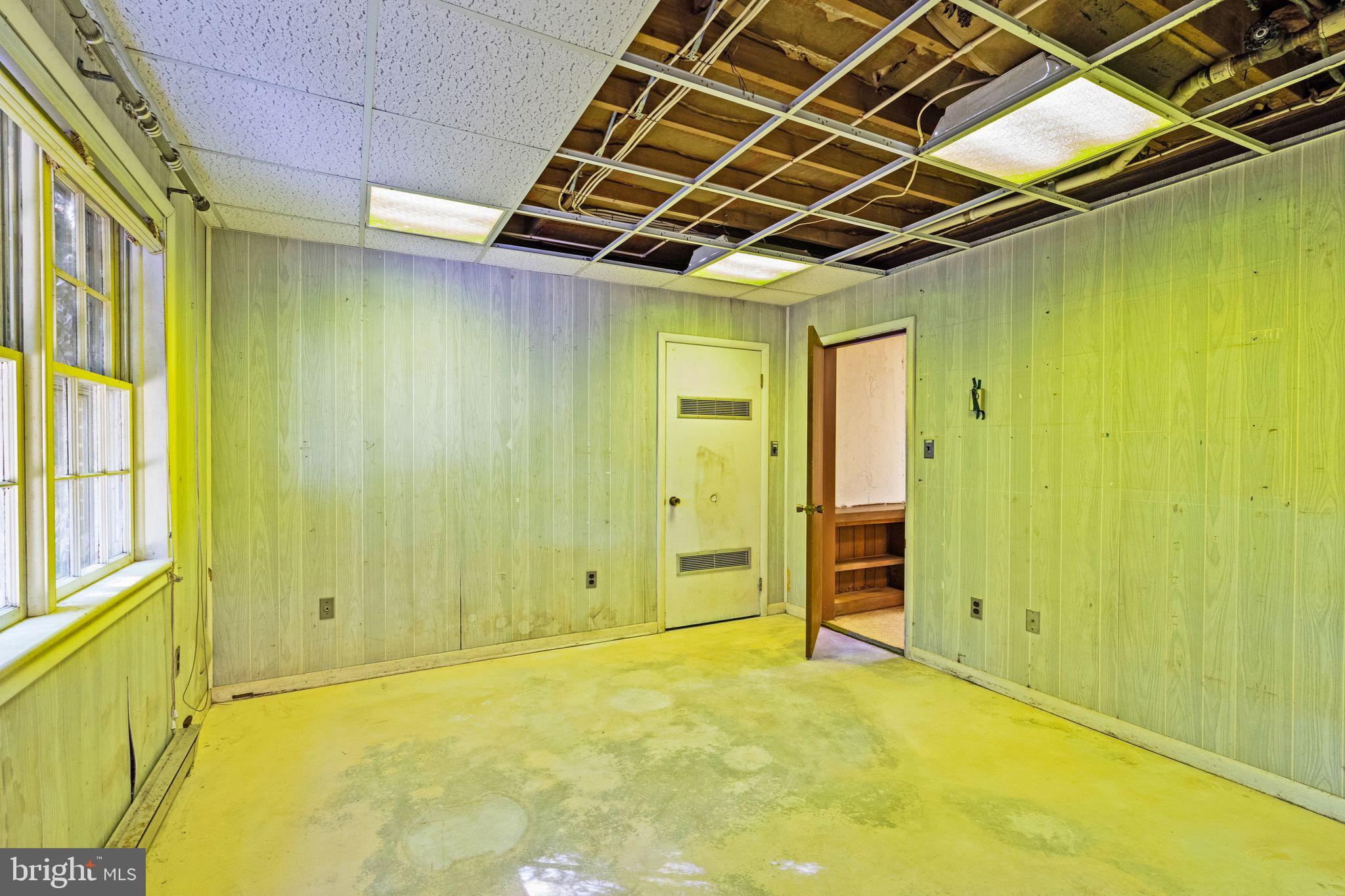 8311 Pohick Road Springfield, VA 22153 - Photo 56 of 92 a view of empty room with wooden walls