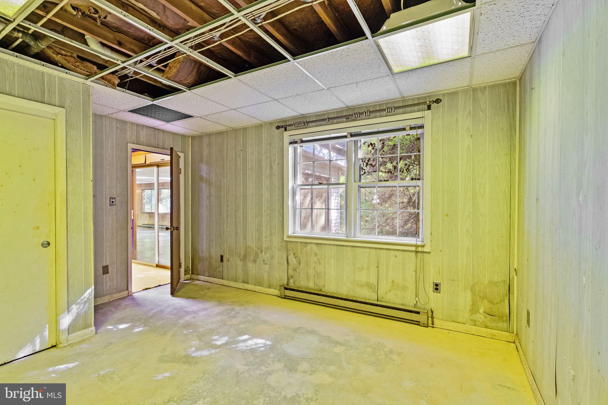 8311 Pohick Road Springfield, VA 22153 - Photo 57 of 92 an empty room with windows